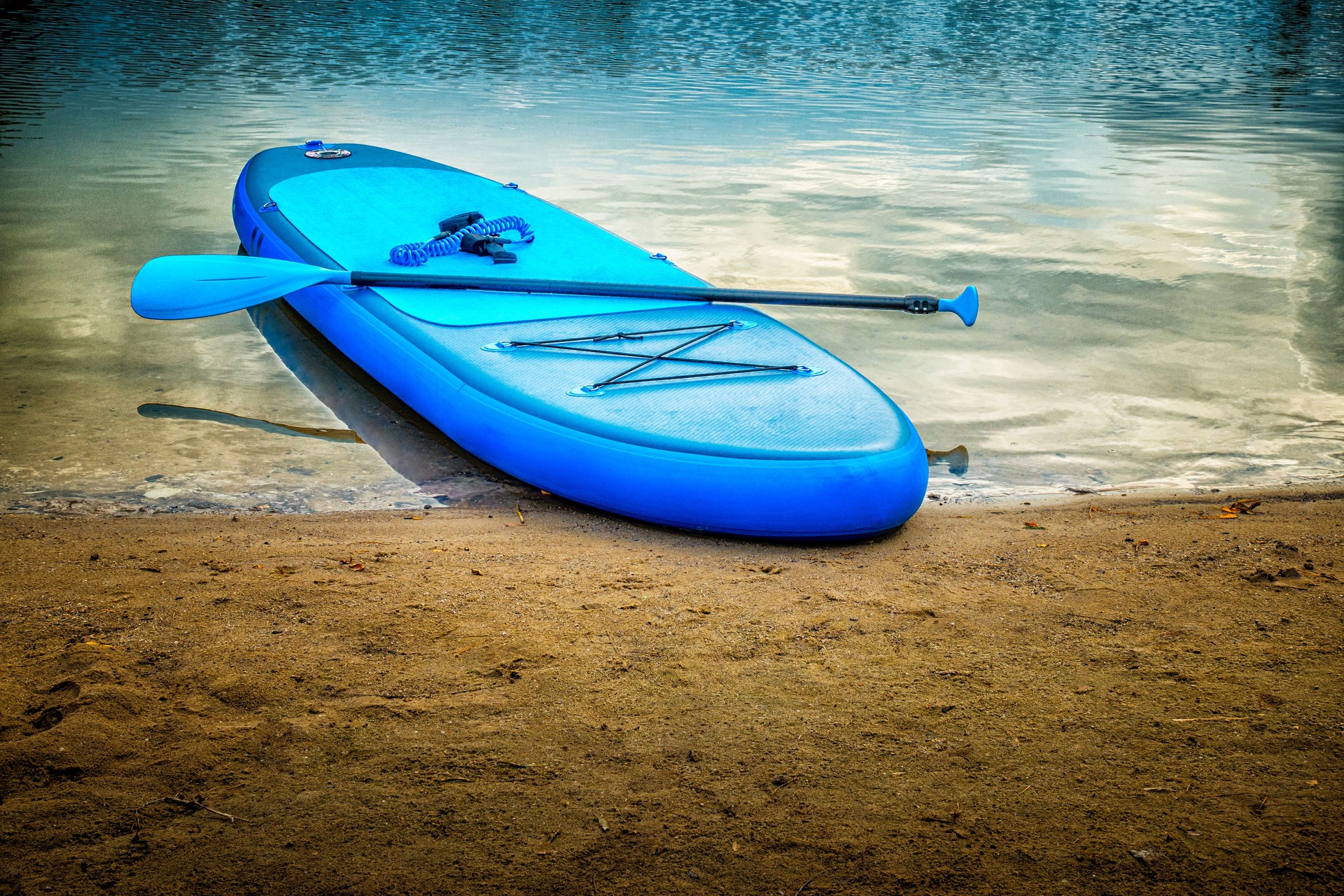 paddleboarding along the Colorado River near Willow Beach with scenic cliffs and Emerald Cave.